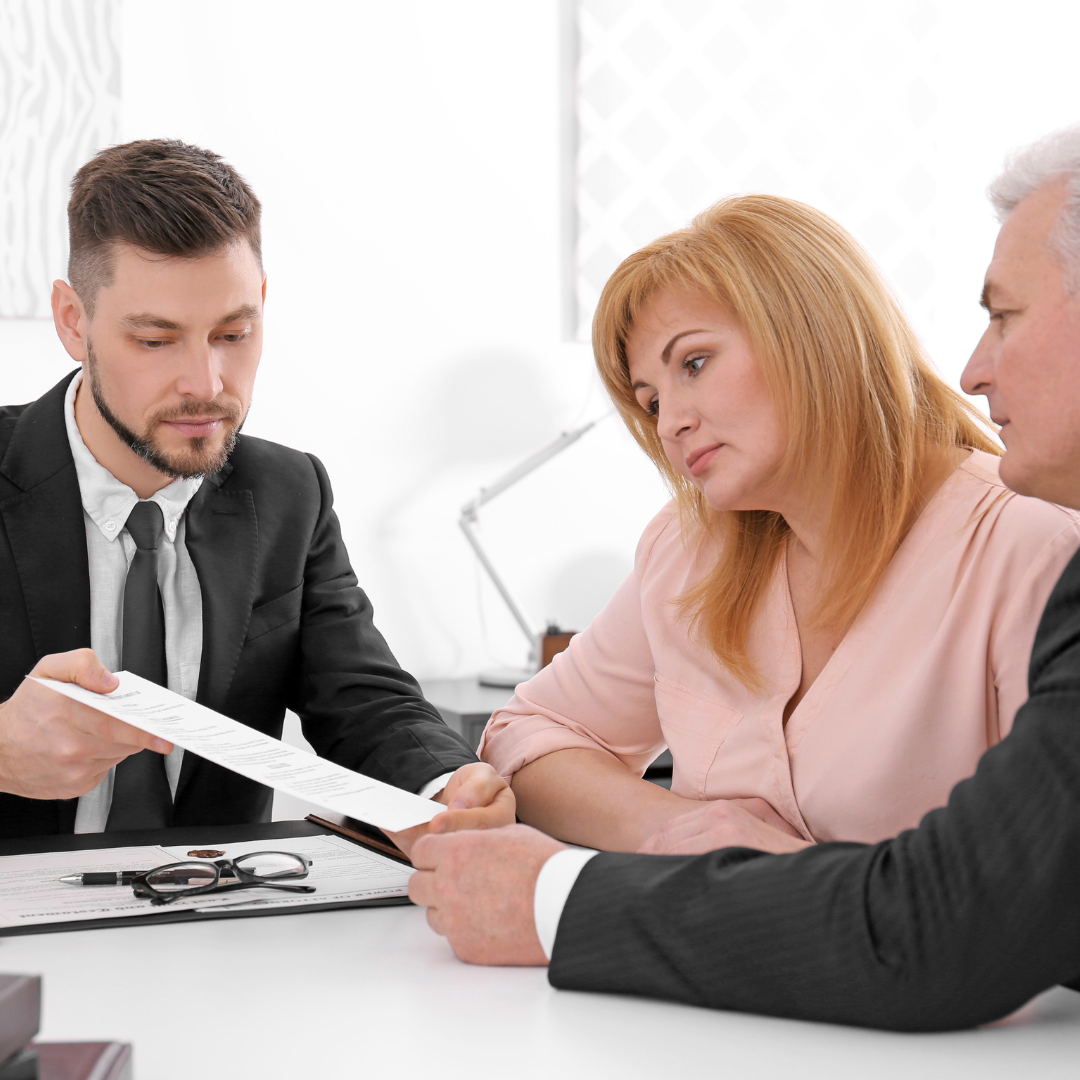 Solicitor meeting with two clients to discuss powers of attorney and court of protection matters representing legal advice by Martin Shepherd Solicitors in Potters Bar, Hertford, North Finchley, North London and Hertfordshire.